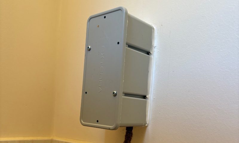 Above-ground termite bait box installed on active workings in a Bendigo home